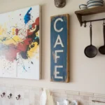 Modern kitchen with vibrant wall art above the countertop.